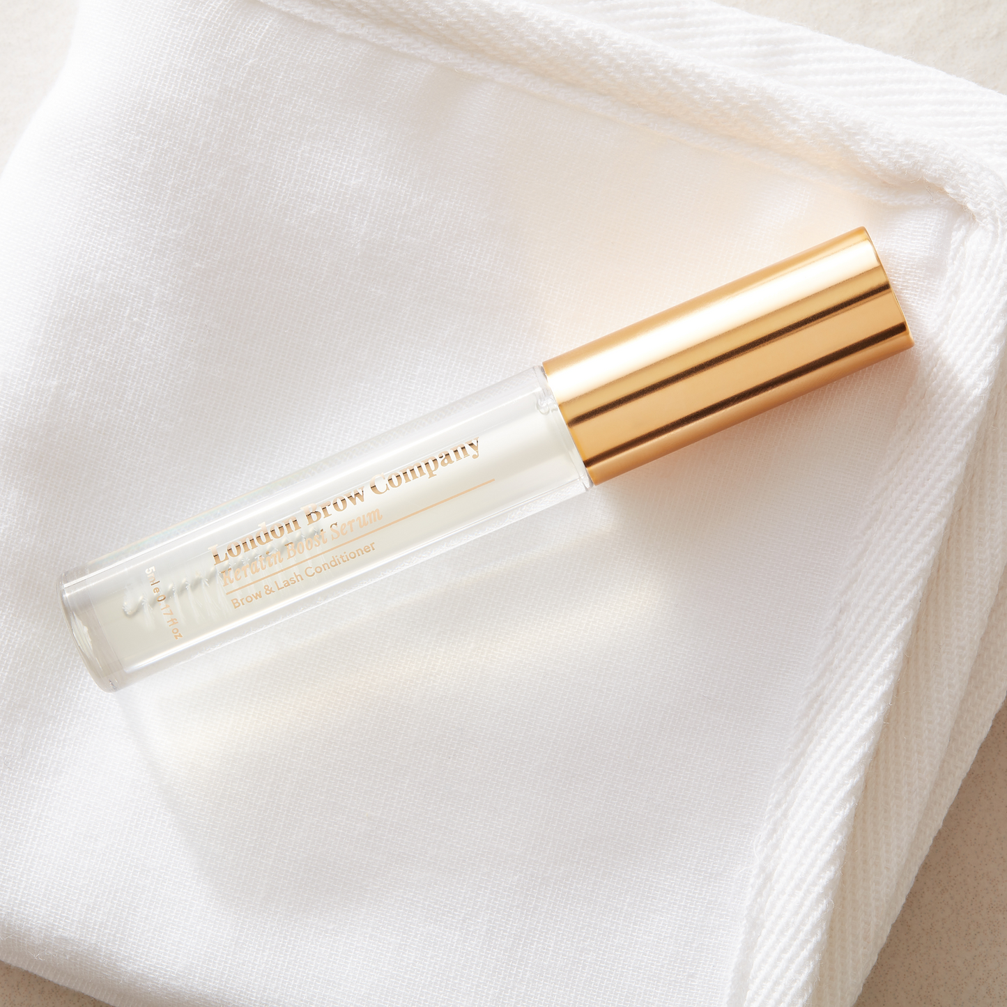 Nourishing vegan serum for brows and lashes. Strengthens, hydrates, and restores after lamination or lash lift. Daily conditioning and overnight treatment in one. Video showing bottle and opening