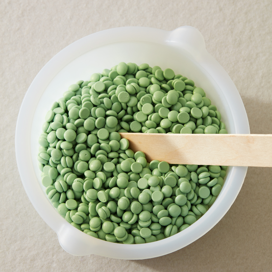 Green tea hot wax pellets for gentle, smooth hair removal — London Beauty Company