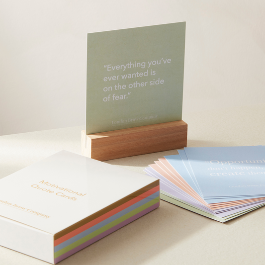 12 motivational quote cards with a wooden stand. Inspiring daily affirmations for home, work, or gifting from The London Beauty Company.