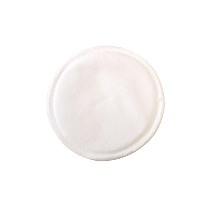 Front of white reusable cotton pad from the london brow company
