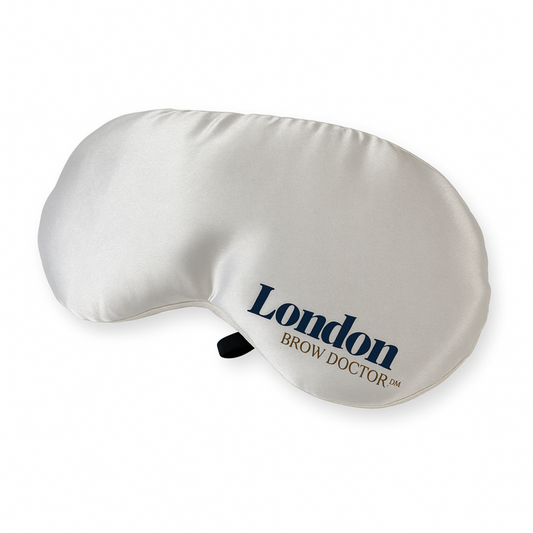 White eye mask with 'London Brow Doctor' branding on a white background