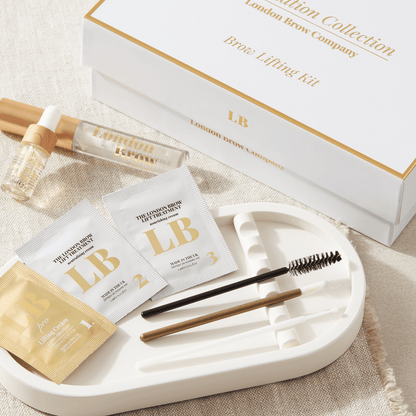 Eyebrow care kit with 'London Brow Collection' branding on a beige surface.