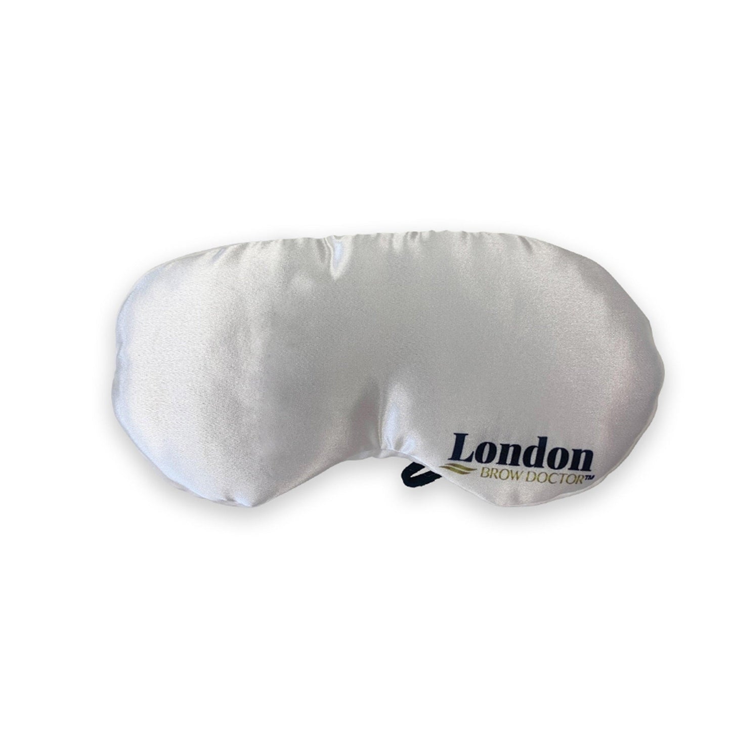 White eye mask with 'London Brow Doctor' branding on a white background